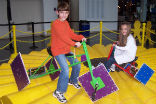 Image of The Math Midway is the only place where you can ride a square-wheeled tricycle. 