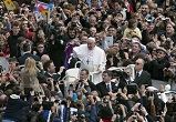 Image of Francis greets the crowds in St Peters square