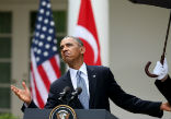 Image of Obama making light of violating Corps regulations.