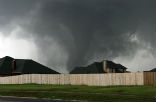 Image of The deadly tornado as it approaches homes in Moore, OK.