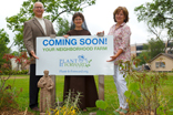 Image of Pat O'Donnell, Sister Damien Marie Savino and Teresa O'Donnell stand in front of the new Plant It Forward site on the University of St. Thomas campus. 