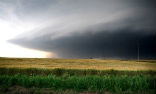 Image of The El Reno Tornado was so massive that observers would have mistaken it for a low-hanging cloud base dipping below the horizon. 