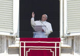 Image of Pope Francis gives the Angelus prayer at the Vatican.