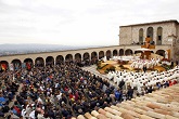 Image of Thousands gather for the opening Mass of the historic visit of Pope Francis to Assisi, to honor the continuing call of conversion in the life, message and prophetic challenge of Francis of Assisi, his namesake