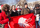 Image of Students from the University of St. Thomas - Houston, brave the cold weather as they march with nearly half a million others from across the country, declaring their pro-life stance.