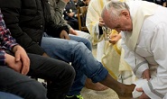 Image of Francis washes the feet of Jesus, in prison