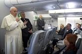 Image of (Pictured: Pope Francis on the plane) - We have an obligation to become men and women of prayer, grounded in the Bible and actual teachings of the magisterium of the Catholic Church. We need to be ready to defend the Church. We also have a special obligation to work with our other Christian friends as they try to sort though what this Pope is actually saying, in the morass of often propagandized media reports. 