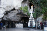 Image of Lourdes in France is the site of massive pilgrimages for Christians, and saw apparitions of the Virgin Mary in the 19th century.