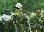 Image of Members of Colombia's Marxist rebel organization the Revolutionary Armed Forces of Colombia, which have utilized the drug trade to fund their five-decade-long war against the Colombian government.