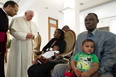 Image of Pope Francis giving a blessing to Meriam and her youngest child