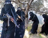 Image of Some reports indicate that ISIS now has roving patrols in the city of Raqqa, including women draped in head to floor burqas, who are ordered to ensure strict compliance with their version of Islamic Dress codes.