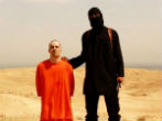 Image of James Foley a moment before his gruesome beheading. 