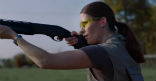 Image of Kentucky Senate candidate, Alison Grimes, seen here with a shotgun in an ad where she attempts to distance herself from the disastrous and unpopular policies of President Barack Obama.