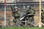 Image of Armed members of Canada's Royal Mounted Police are searching for an unknown number of shooters in Ottawa, Canada's capital.
