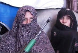 Image of After seeing her son murdered by Taliban fighters,  Reza Gul picked up a gun, and along with her daughter and daughter-in-law, killed 25 of the militants in a seven-hour-long battle.