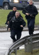 Image of Police storm the locations of terrorist brothers and their accomplice Friday morning after hostages were taken in.