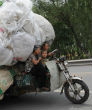 Image of Much of the developing world relies on cheap, inefficient and dangerous scooters, as a main form of transportation.