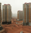 Image of One of China's many ghost towns. Built at the height of a massive real estate boom, many Chinese cities and suburbs now lay empty.