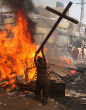Image of Christians often have to face brutal violence from Muslims, just because they're Christians.