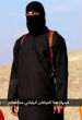 Image of A man dressed in all black, with British accent, threatens the lives of two Japanese men in newest ISIS video.