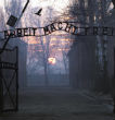 Image of The gates of the Auschwitz death camp, which in English say 