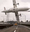 Image of A TransAsia Airways ATR 72-600 crashes into a Taipei river, killing at least 26 with 17 still missing. 