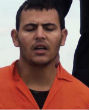 Image of A still from a video published by the Islamic State which shows the beheading of 21 Egyptian Christians in Libya.