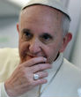 Image of Pope Francis speaks out on the refugee crisis during a radio interview.