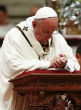 Image of Pope Francis speaks of the birth of Christ then compared the Christ Child to migrants (Tony Gentile/Reuters).