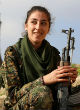 Image of Christian women take up arms in fight against Muslim extremists (AFP/Getty Images).