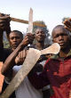 Image of Christians attempting to stop drug traffickers (not pictured) from selling opium were attacked with machetes (AFP/Getty Images).