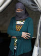 Image of Mother of nine had daughters kidnapped after ISIS militant smashes her face with AK-47 (i-Images).