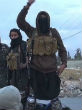 Image of ISIS releases new video of prisoners being executed via stabs to the heart (YouTube).