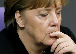 Image of Protestors fight Merkel's open-door policy.