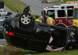 Image of Girl trapped in SUV (not pictured) saved by strangers.