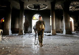 Image of Christian citizens and troops entered the damaged Church to practice Mass (Reuters).