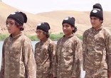 Image of ISIS continues to use Cubs of the Caliphate to carry out the less savory jobs.