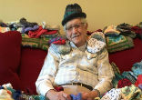 Image of Ed Moseley taught himself to knit, so he could make hats for premature babies. 