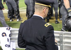Image of The only person taking a knee at the Army-Navy Game at West Point (New Advent).