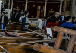 Image of A bombing in Cairo has destroyed a church and killed at least 25 of its parishioners.