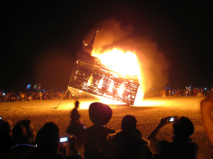 A church is burned in full-scale effigy at the Burning Man festival, an expression of pop culture.