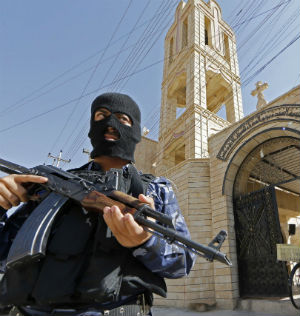 ISIS terrorists take over a Christian church in Mosul.