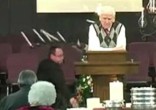 Image of The pastor handled the hilarious situation with straight face (Bromeatheus Bobalatte/YouTube).