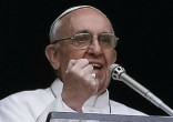Image of Pope Francis admits he doesn't like to travel but does so anyway to spread hope.