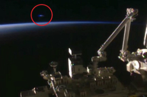 City lights? A reflection? A rocket? What could it be? Perhaps... a UFO?