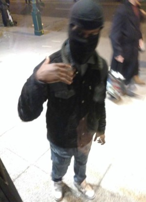 Masked man revealed an ISIS flag and beheading video on his phone (InfoWars).