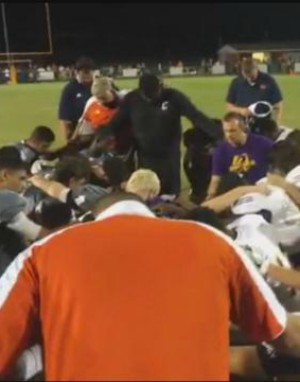 Youth pastor under fire for praying for injured player.