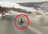 Image of Pregnant woman thrown from ambulance in Russia.