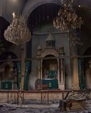 Priest visits Catholic church (not pictured) after ISIS clears out.
