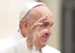 Image of Pope Francis refuses to back down.